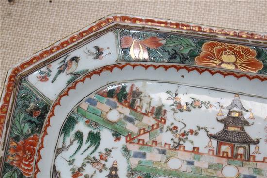 An 18th century Chinese famille verte octagonal meat plate, decorated with pagodas in a garden, flowers and birds, 36 x 26cm